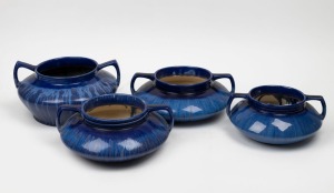 MELROSE WARE group of four blue glazed two handled pottery urns, two examples stamped "Melrose Ware, Australian", the largest 14.5cm high, 27cm wide