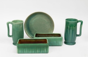 MELROSE WARE pair of green glazed pottery tankards, pair of green glazed pottery flower troughs and a HOFFMAN green glazed pottery plate, (5 items), the plate 24cm diameter