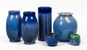 MELROSE WARE group of six assorted blue glazed pottery vases, one with gum leaf decoration and another example with green highlights, the largest 26cm high