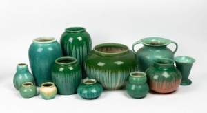 MELROSE WARE group of twelve assorted green glazed pottery vases, the largest 27cm high