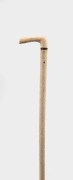 An antique walking stick with whale's tooth handle, baleen spacer and whalebone shaft, 19th century, 96cm high - 2