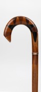 An antique walking stick with sample wood handle including huon pine, blackwood, cedar and some form of exotic ebony, mounted with a rose gold collar with ownership inscription, on a beefwood casuarina shaft with brass ferrule, early 20th century, 88cm hi - 2