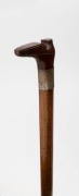 An antique Australian walking stick with carved boot handle, silver collar on a fiddleback blackwood shaft with brass ferrule, 19th century, 79cm high - 2