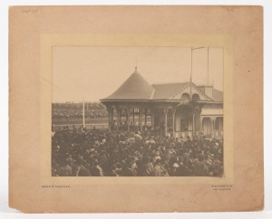 BAKER & FARQUHAR original silver gelatine print depicting a scene at the Melbourne Cup circa 1890, mounted on card; the image 16 x 20.5. Overall 25 x 30.5cm.