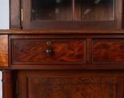An antique Colonial Australian cedar bookcase with Gothic arched doors, three drawers and full turned columns, New South Wales origin, mid 19th century. Note: This originally was a built-in bookcase, sides have been altered. 259cm high, 146cm wide, 47cm d - 3