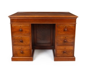 An antique Australian cedar knee hole pedestal desk, solid timber top with well selected cuts of Australian cedar, circa 1860, 77cm high, 108cm wide, 51cm deep