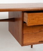 HANS HAYSON&nbsp;mid-century style writing desk with teak veneered top above a bank of three drawers, supported on turned teak legs, 20th century, 70cm high, 123cm wide, 63cm deep - 3