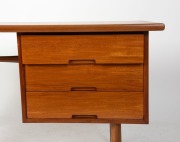 HANS HAYSON&nbsp;mid-century style writing desk with teak veneered top above a bank of three drawers, supported on turned teak legs, 20th century, 70cm high, 123cm wide, 63cm deep - 4