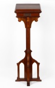 A Gothic revival Tasmanian blackwood lectern with grape and leaf carved panel,&nbsp;mid 20th century, bearing brass dedication plaque "In loving remembrance of my husband, Norman McKinnon who fell asleep in Jesus on June 16th, 1943", 126cm high, 41cm wide, 41c - 2