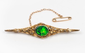 A vintage 9ct yellow gold and opal doublet brooch, early 20th century, stamped "9ct", ​​​​​​​5.8cm wide, 4.7 grams