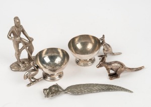 Australian novelty silver plated ware including emu and kangaroo salts, koala letter opener, Aboriginal figure, and kangaroo rest, 20th century, (5 items), ​​​​​​​the largest 10cm high