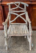 An Australian folk art stick armchair with remains of original painted finish, 19th/20th century, 99cm high, 57cm across the arms - 2