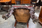 A fine quality Colonial ceremonial chair with ornate carving and recessed casters, mid 19th century - 2