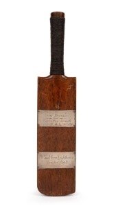 A miniature bat, with two applied silver plaques; the first engraved "To ERNIE BROMLEY from Busselton Branch Y.A.L. 22/3/34" and the second one engraved "Wood from Lighthouse erected 1863". Bromley was the first West-Australian born cricketer to be selected in the Australian Test team. Provenance: The Estate of Ernie Bromley.