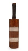 A miniature bat, with two applied silver plaques; the first engraved "To ERNIE BROMLEY from Busselton Branch Y.A.L. 22/3/34" and the second one engraved "Wood from Lighthouse erected 1863". Bromley was the first West-Australian born cricketer to be select