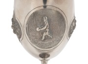 THE CARLTON FOOTBALL CLUB CHALLENGE CUP - 1876 - WON BY GEELONG PLAYER, WILLIAM "TRUSTY" HALL OF THE GEELONG FOOTBALL CLUB A sterling silver cup depicting a footballer about to kick for goal and engraved "Carlton Football Club Challenge Cup for DROP KICK - 4