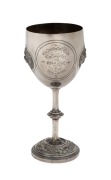 THE CARLTON FOOTBALL CLUB CHALLENGE CUP - 1876 - WON BY GEELONG PLAYER, WILLIAM "TRUSTY" HALL OF THE GEELONG FOOTBALL CLUB A sterling silver cup depicting a footballer about to kick for goal and engraved "Carlton Football Club Challenge Cup for DROP KICK - 2