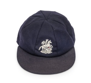TIM ROBINSON (England): Robinson's England "Touring" Test Team Cap, navy blue wool with embroidered St. George and the Dragon, endorsed in pen "T. Robinson" on the white label in the crown of the cap. From Robinson's last year in the Test Team, 1989.