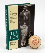 DENNIS LILLEE pen signed A.G.Thompson P/L white hide cricket ball; together with a copy of "The Don" by Roland Perry [1995], signed by Don Bradman and endorsed and signed by the author. (2 items).