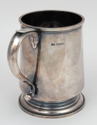 A STERLING SILVER TANKARD PRESENTED TO BILL WOODFULL&nbsp;BY BILL FERGUSON, with the engraved dedication W. M. WOODFULL from 'PERCY' MAY THE HINGES OF FRIENDSHIP NEVER RUST, 5th SEPT. 1934; 12cm tall. - 2