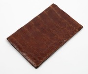 A Smythson of Bond Street leather wallet, with multiple internal compartments and gilt lettering: "With Congratulations and Best Wishes to MR. E.H. BROMLEY from W. Harrison. Australia v England 1934."&nbsp; The wallet contains are original photo postcard of Br - 2