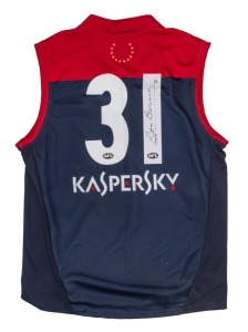 A Melbourne No. 31 short-sleeved team jersey worn in a 'Club Assist' charity match attended by Ron Barassi and signed by him on the occasion.