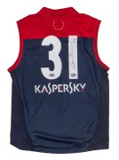 A Melbourne No. 31 short-sleeved team jersey worn in a 'Club Assist' charity match attended by Ron Barassi and signed by him on the occasion.