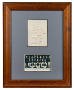 1938 Australian team sheet fully signed and mounted together with a reproduction photograph of the team led by Don Bradman; framed & glazed, overall 55 x 44.5cm.