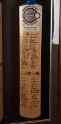 Two souvenir bats framed together, the first being No. 1716 of 2000&nbsp;created for the 1985 World Championship of Cricket with signatures from all seven teams, the second being No. 279 of 1800 created for the Benson & Hedges World Cup 1992 with signatures fr - 2