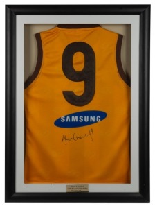 SHANE CRAWFORD Original signature on the reverse of a No. 9 Hawthorn Football Club guernsey; Framed and glazed; Overall 90 x 66cm Shane Crawford was awarded the 1999 Brownlow Medal