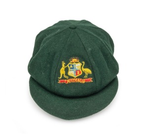 KERRY O'KEEFE'S AUSTRALIAN TEST TEAM BAGGY GREEN CAP with embroidered Australian coat of arms to the front panel; with his initials "KOK" in pen to the Albion Australia maker's panel affixed inside. Kerry James O'Keefe appeared for Australia in 24 Test Matches between 1971 and 1977. Thanks to his comedic anecdotes and unique mannerisms, he later emerged as a popular commentator among fans.