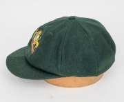 KERRY O'KEEFE'S AUSTRALIAN TEST TEAM BAGGY GREEN CAP with embroidered Australian coat of arms to the front panel; with his initials "KOK" in pen to the Albion Australia maker's panel affixed inside. Kerry James O'Keefe appeared for Australia in 24 Test M - 6