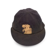 DOUGLAS WRIGHT'S ENGLAND TOURING TEST TEAM CAP with embroidered St. George & the Dragon embroidered to front panel; the Simpson of Piccadilly nametag&nbsp;endorsed "D.V.P. WRIGHT" in ink; minor faults at right. Douglas Wright played in 34 Test Matches for Eng