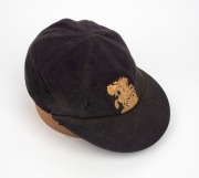 DOUGLAS WRIGHT'S ENGLAND TOURING TEST TEAM CAP with embroidered St. George & the Dragon embroidered to front panel; the Simpson of Piccadilly nametag&nbsp;endorsed "D.V.P. WRIGHT" in ink; minor faults at right. Douglas Wright played in 34 Test Matches for Eng - 4