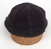DOUGLAS WRIGHT'S ENGLAND TOURING TEST TEAM CAP with embroidered St. George & the Dragon embroidered to front panel; the Simpson of Piccadilly nametag&nbsp;endorsed "D.V.P. WRIGHT" in ink; minor faults at right. Douglas Wright played in 34 Test Matches for Eng - 5