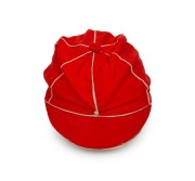 A TASMANIAN COLONIAL CRICKET CAP from the late 19th Century, red with white piping, a button-down peak, and with an illegible signature under the brim. Although worn in places, in remarkably good condition for one of the oldest surviving Australian cricke