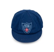 GLENN McGRATH'S NEW SOUTH WALES CRICKET TEAM CAP, circa 2000, blue wool, with embroidered NSWCA logo to front panel, signed in ink on the Albion label by McGrath. Fine condition. Glenn McGrath appeared in 124 Test Matches for Australia between 1993 and 2