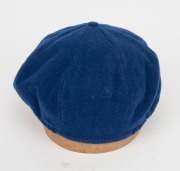 GLENN McGRATH'S NEW SOUTH WALES CRICKET TEAM CAP, circa 2000, blue wool, with embroidered NSWCA logo to front panel, signed in ink on the Albion label by McGrath. Fine condition. Glenn McGrath appeared in 124 Test Matches for Australia between 1993 and 2 - 5