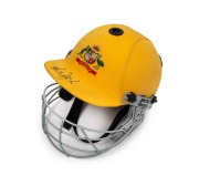PAUL REIFFEL'S AUSTRALIAN TEAM ONE-DAY CRICKET HELMET: yellow fabric over the protective helmet, with the Australian coat-of-arms embroidered to the front panel; made by Albion with their "97-98" dated label at right on the protective grill. In very good 