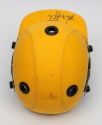 PAUL REIFFEL'S AUSTRALIAN TEAM ONE-DAY CRICKET HELMET: yellow fabric over the protective helmet, with the Australian coat-of-arms embroidered to the front panel; made by Albion with their "97-98" dated label at right on the protective grill. In very good - 4