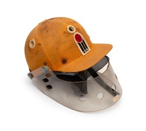 KERRY PACKER'S WORLD SERIES CRICKET 1977 - 1979: An original W.S.C. Australian team batting helmet with protective visor, the W.S.C. logo stitched to the front of the helmet; in match-worn condition. Extremely scarce.