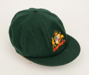 GRAEME WOOD'S AUSTRALIAN TEST TEAM BAGGY GREEN from the 1985 Ashes Tour of England, with the Australian coat-of-arms embroidered to the front panel; made by Albion, with their original label which also bears Wood's original signature in ink. Fine conditio - 4