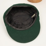 GRAEME WOOD'S AUSTRALIAN TEST TEAM BAGGY GREEN from the 1985 Ashes Tour of England, with the Australian coat-of-arms embroidered to the front panel; made by Albion, with their original label which also bears Wood's original signature in ink. Fine conditio - 7