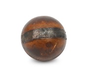 An 1883 trophy leather cricket ball with a silver panel affixed and engraved "R.C.A.S. THROWING CRICKET BALL 109Yds.2Ft. 9In. - E. STANLEY - "; very good condition, considering its' age.