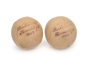 A pair of Buchanan's of Piccadilly tennis balls, bearing the manufacturer's 1887 dated handstamp&nbsp;in violet. Both with minor indent mentioned for accuracy, but otherwise in very fine condition for their age. (2).