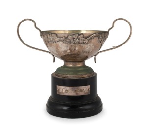 The 1969 Lawn Tennis Association of Australia WILSON CUP, won by EVONNE GOOLAGONG (Cawley) as a member of the New South Wales team; silver-plate with applied grapes and vines, inscribed "LTAA Wilson Cup 1969" above a spreading circular foot, raised on a p