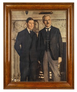 A large gelatin print hand-coloured photograph of Walter Lindrum standing next to English Prime Minister, Ramsay McDonald in front of a fireplace at 10 Downing Street. Framed and glazed, 77 x 63cm overall.