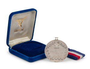 1982 COMMONWEALTH GAMES IN BRISBANE, Silver Winner's Medal, with original ribbon, "1982 XII Commonwealth Games/Brisbane/Australia", 58mm diameter, in original presentation case.
