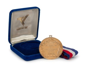 1982 COMMONWEALTH GAMES IN BRISBANE, Gold Winner's Medal, with original ribbon, reads "1982 XII Commonwealth Games/Brisbane/Australia", 58mm diameter, in original presentation case.
