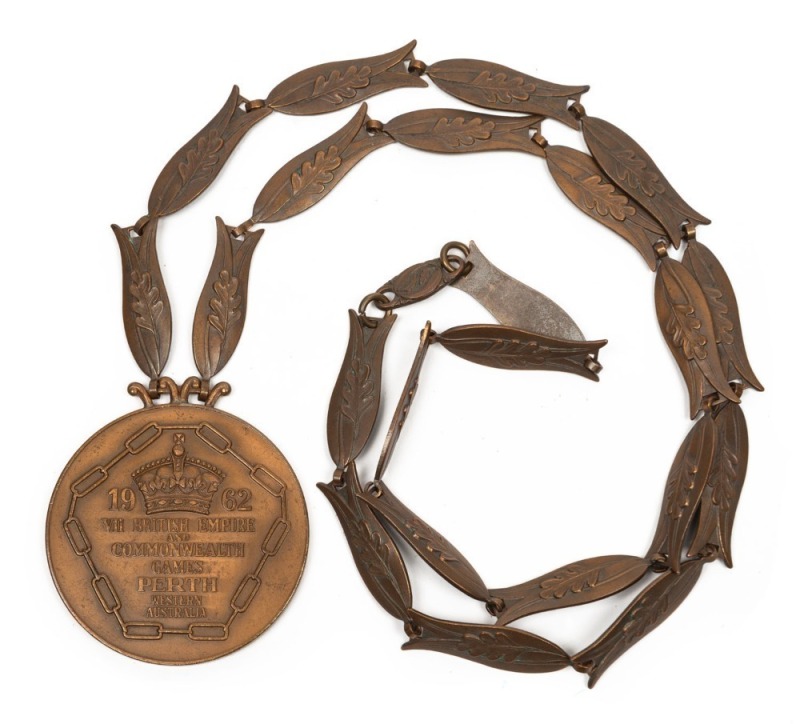 IAN BROWNE'S 1962 BRITISH COMMONWEALTH GAMES IN PERTH, BRONZE WINNER'S MEDAL, with chain, "1962 VII British Empire and Commonwealth Games/Perth/Western Australia", engraved on reverse "Cycling/1000 Metres/Sprint/I.S. Browne/Australia", 58mm diameter. Very